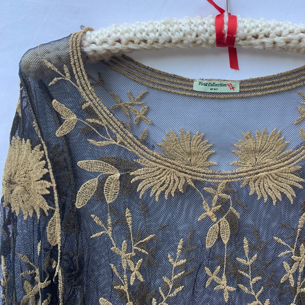 VIVID COLLECTION OF NY witchy sheer black with yellow embroidery. Long sleeve.